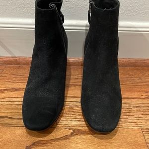 Adorable black booties with tassel